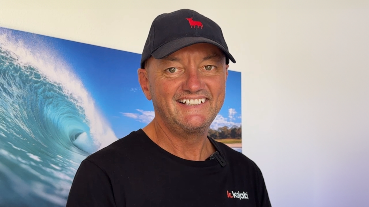 Andy Brown Kajabi Expert in his office