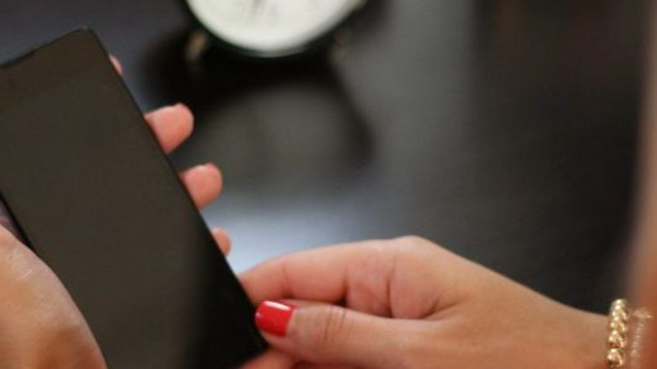 Woman holding a smartphone