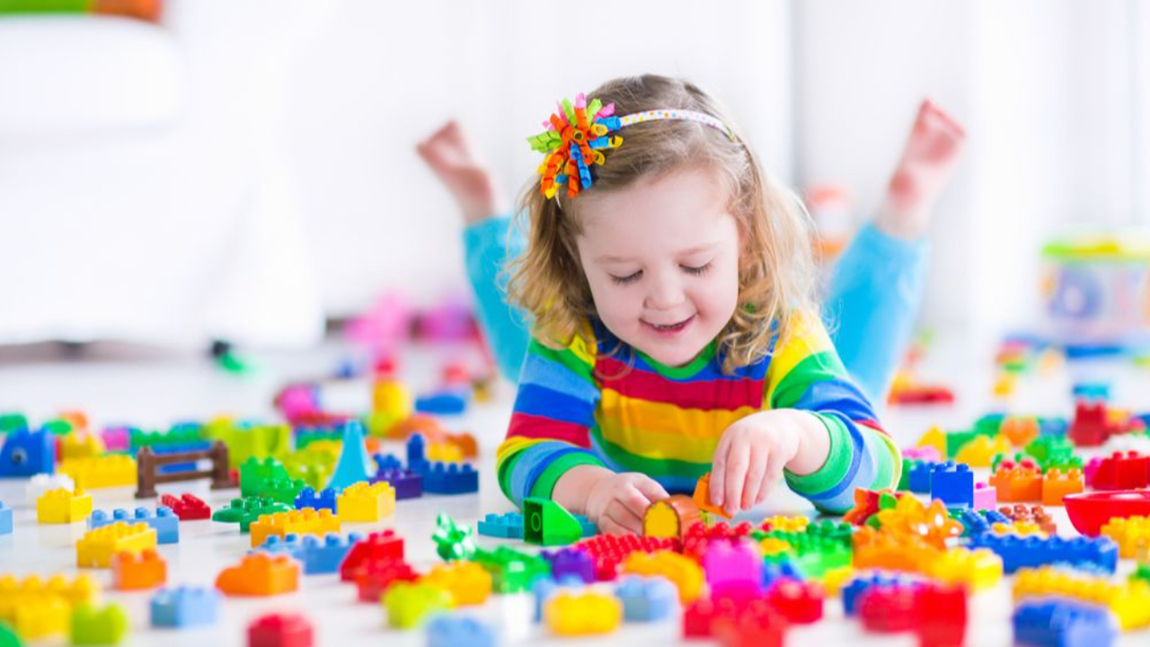 girl playing with blocks