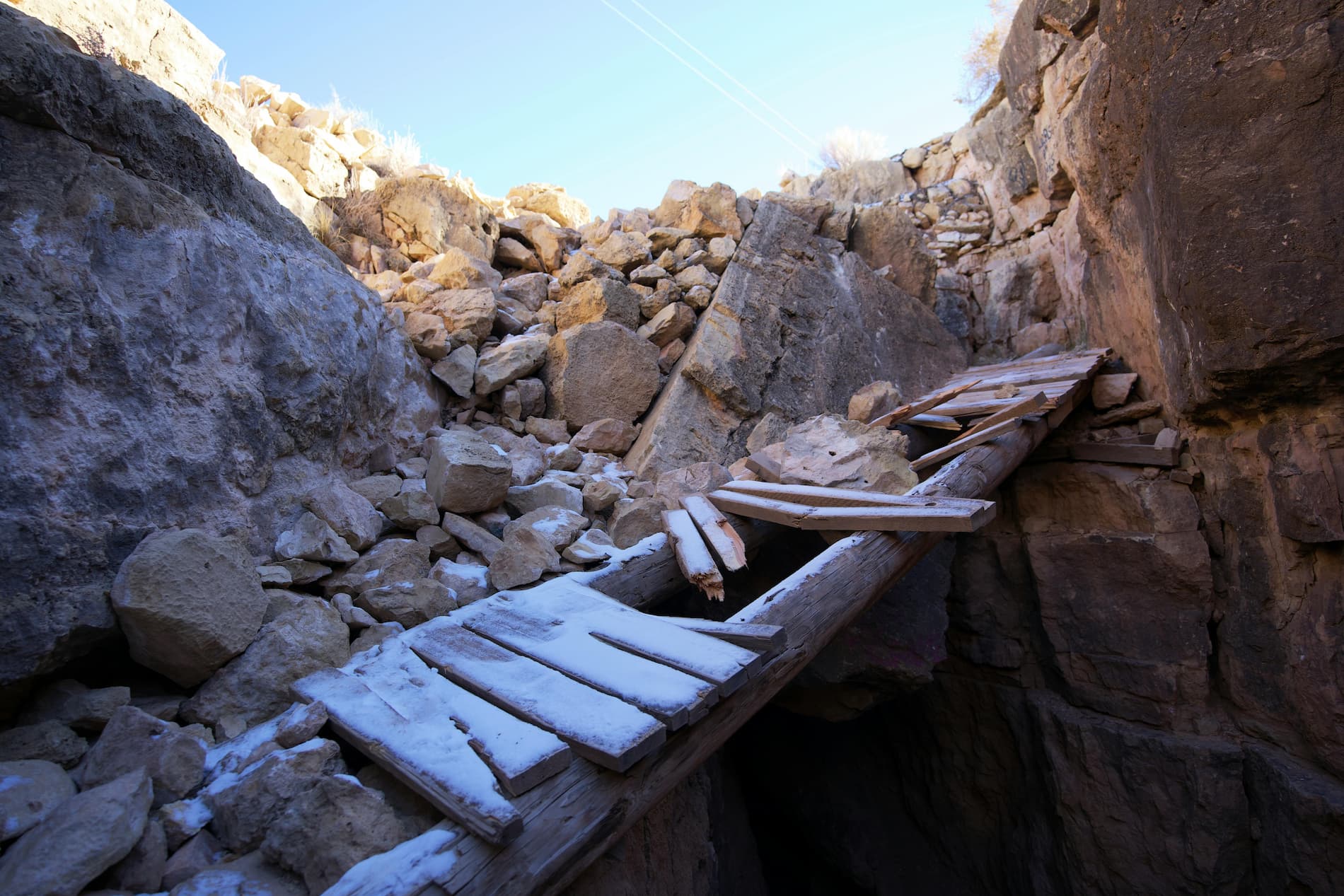 broken bridge symbolising collapse of middle ground