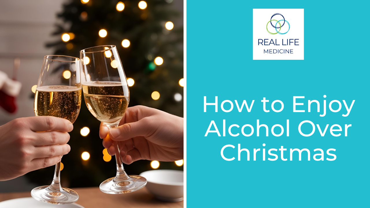 Two people clink glasses of sparkling wine in front of a softly lit Christmas tree with blurred festive lights in the background. On the right, a turquoise panel displays the Real Life Medicine logo and the words "How to Enjoy Alcohol Over Christmas" in large white text.