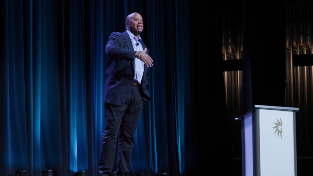 Walter Bond delivering a "Peak Performance" keynote on Stage 4: Recalibration at the Gaylord Palms Orlando, teaching leaders how to break through comfort zones and realize that "No One Can Stop You But You.