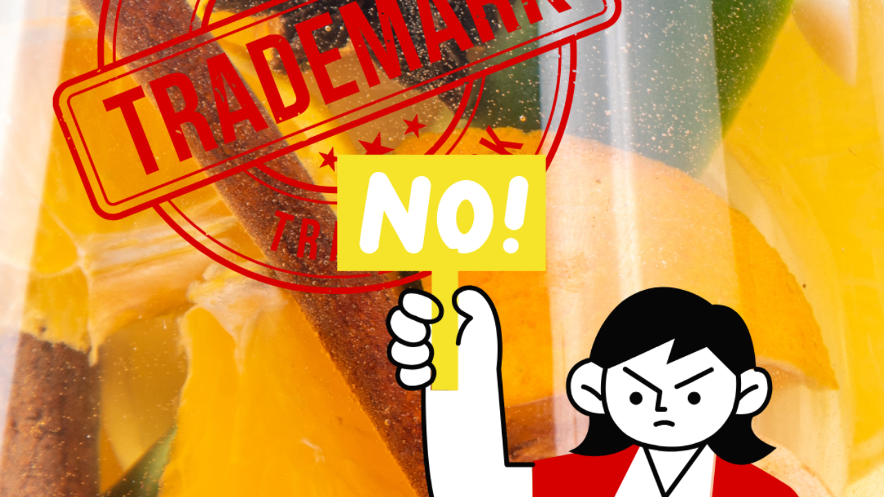 homemade fire cider with a trademark stamp and a fierce person holding up a sign that says no