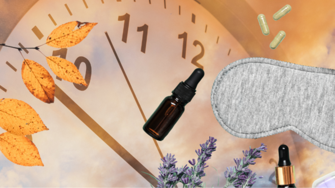 faded clock in front of a sunset with autumn leaves, an eye mask, essential oils, dried lavender and supplements