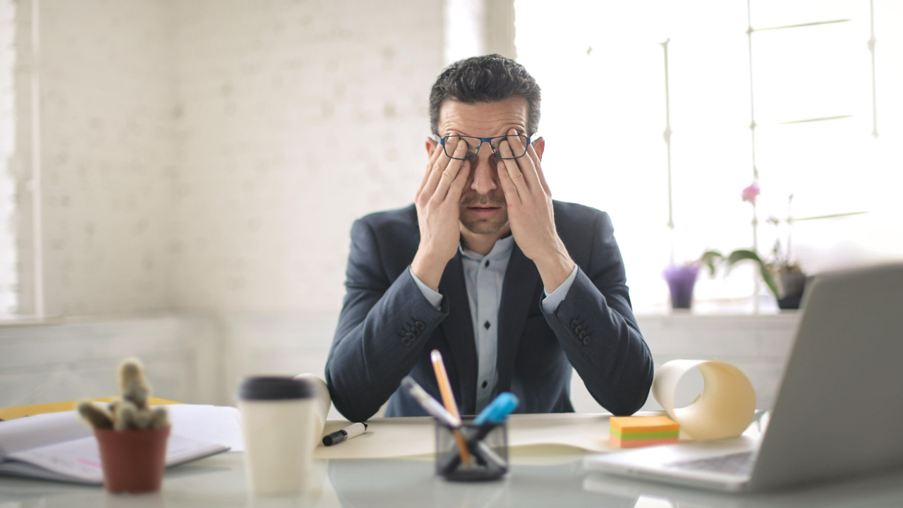 Employee at desk after being laid off.