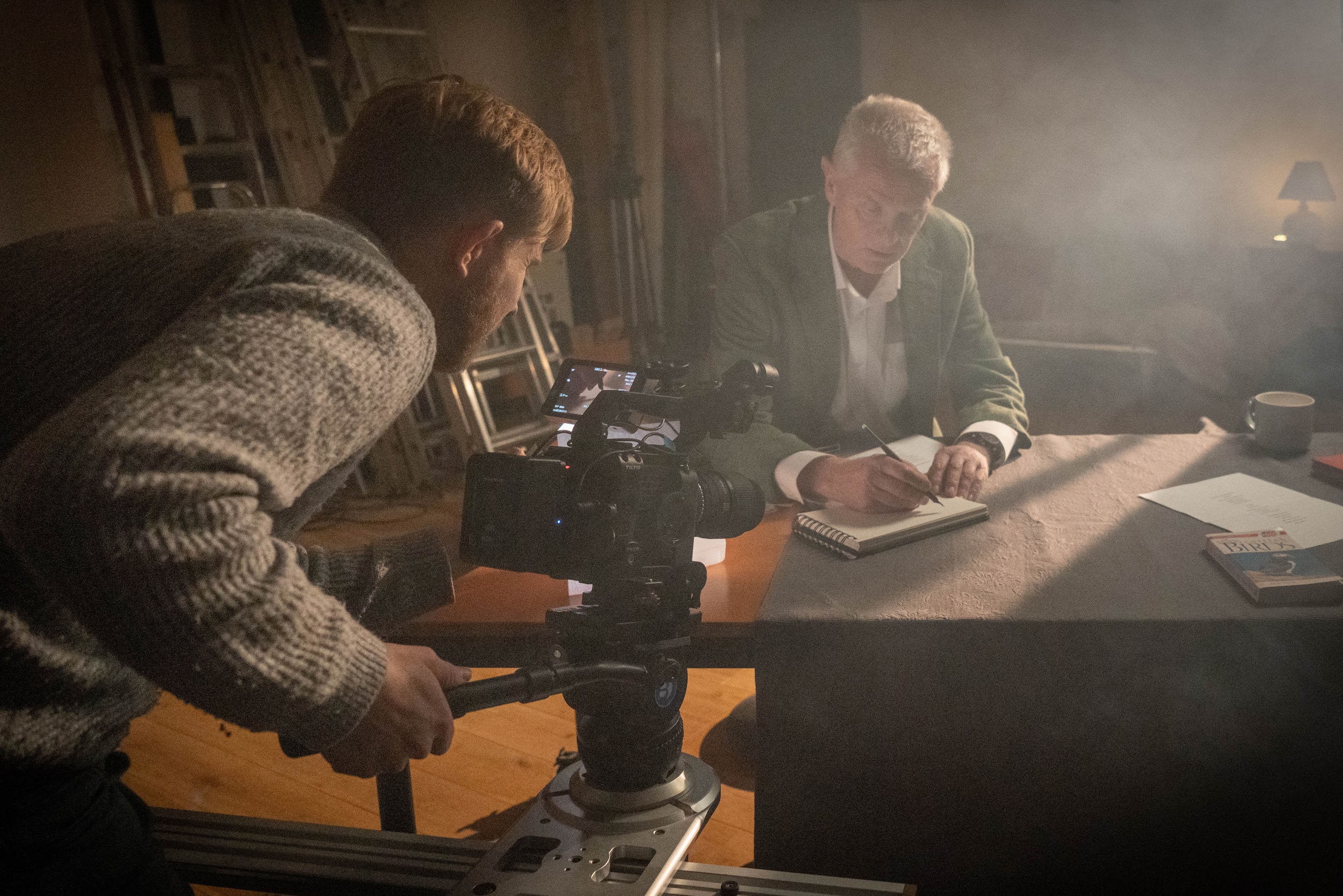 Documentary script writing process on laptop