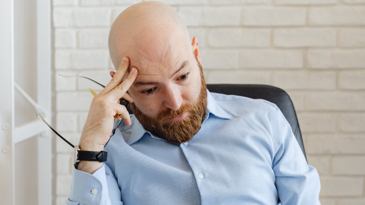 A manager looking weary