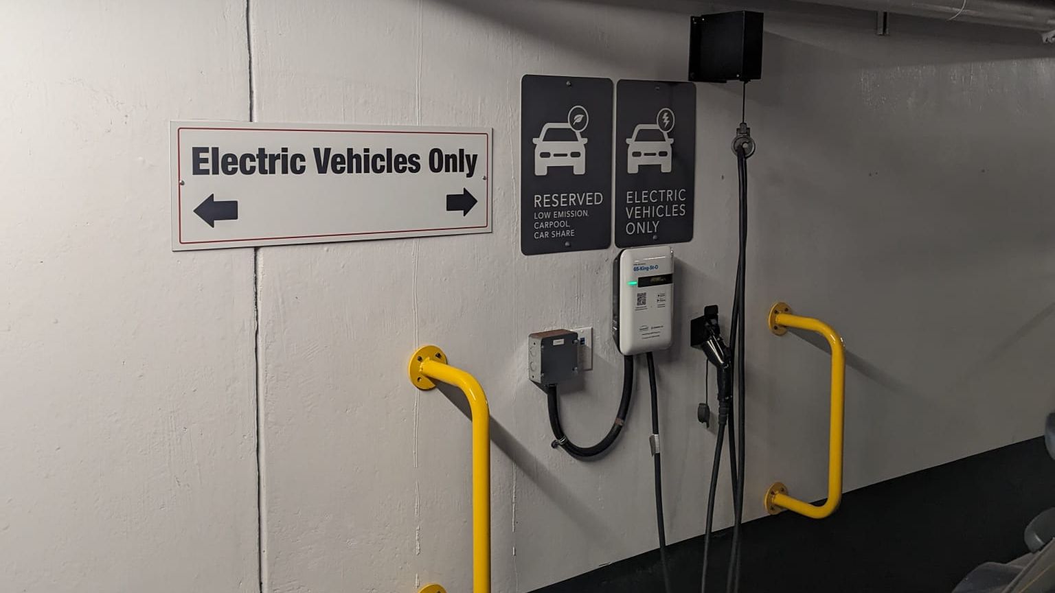 Ev charger installed in condo parking spot.