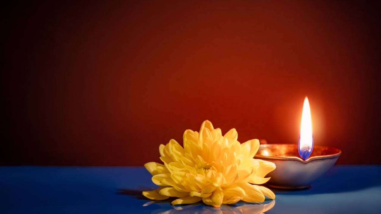 candle with flower - holiday and diwali