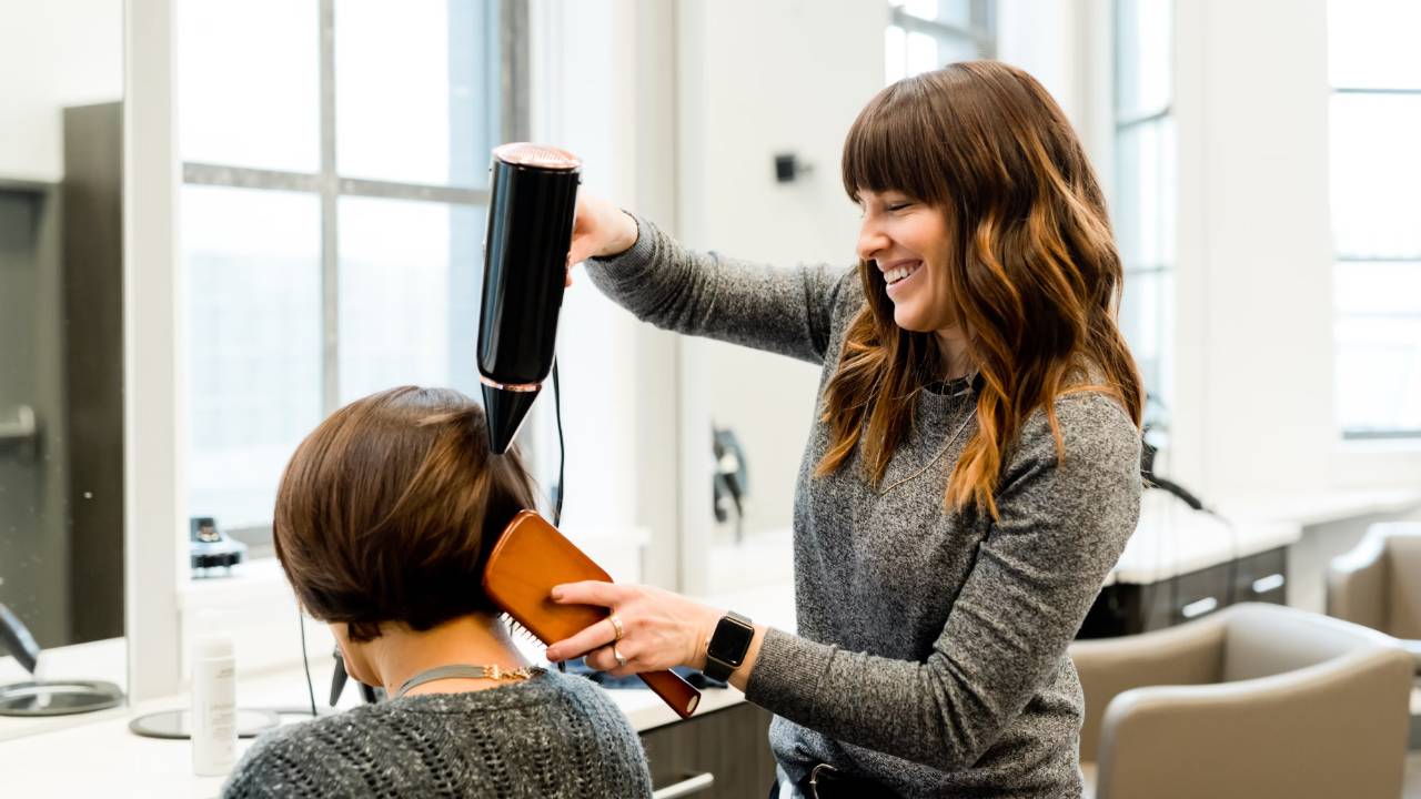 Image of hairdresser at salon.