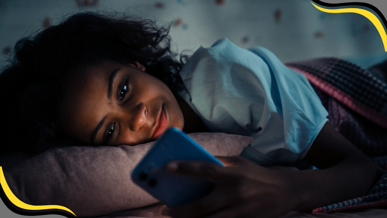 teenager looking at their phone