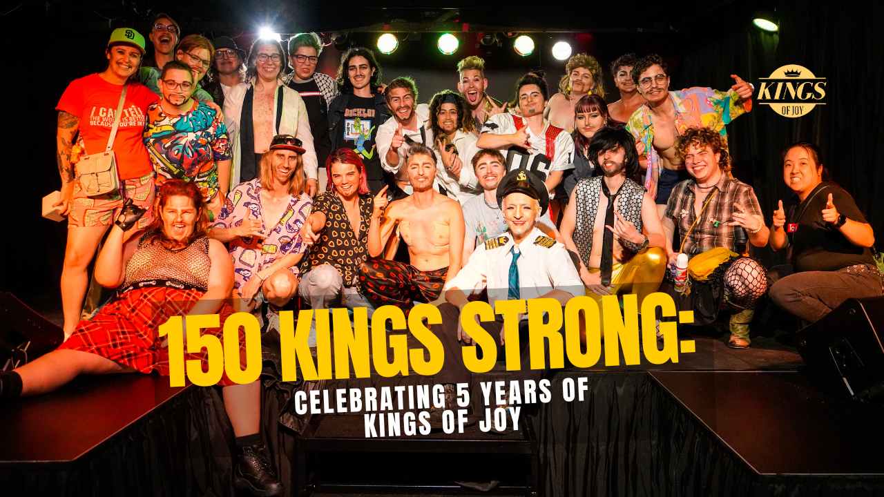 Drag King performers on stage, Kings of Joy community celebration, Sydney queer performance, Drag Kings in costume and makeup, gender exploration through drag