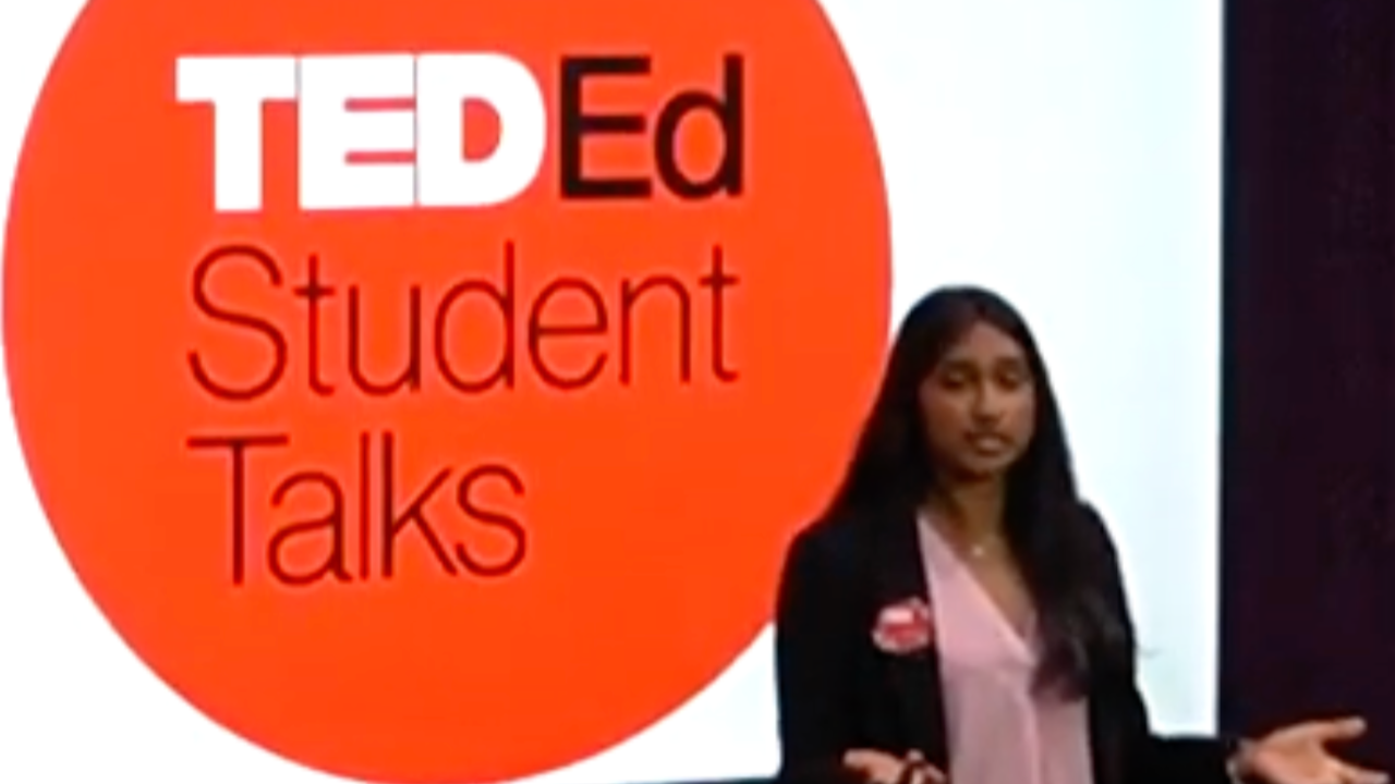 Sindhuja Nednoor presenting on the TED-Ed stage -passion matters