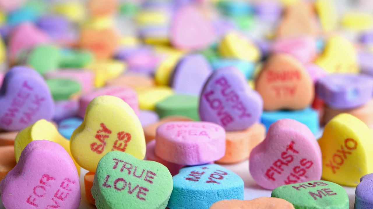 A collection of colourful candy love hearts