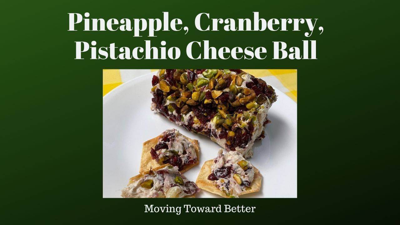 Photo of a Pineapple Cranberry Pistachio Cream Cheese Roll for the blog post of the same name.