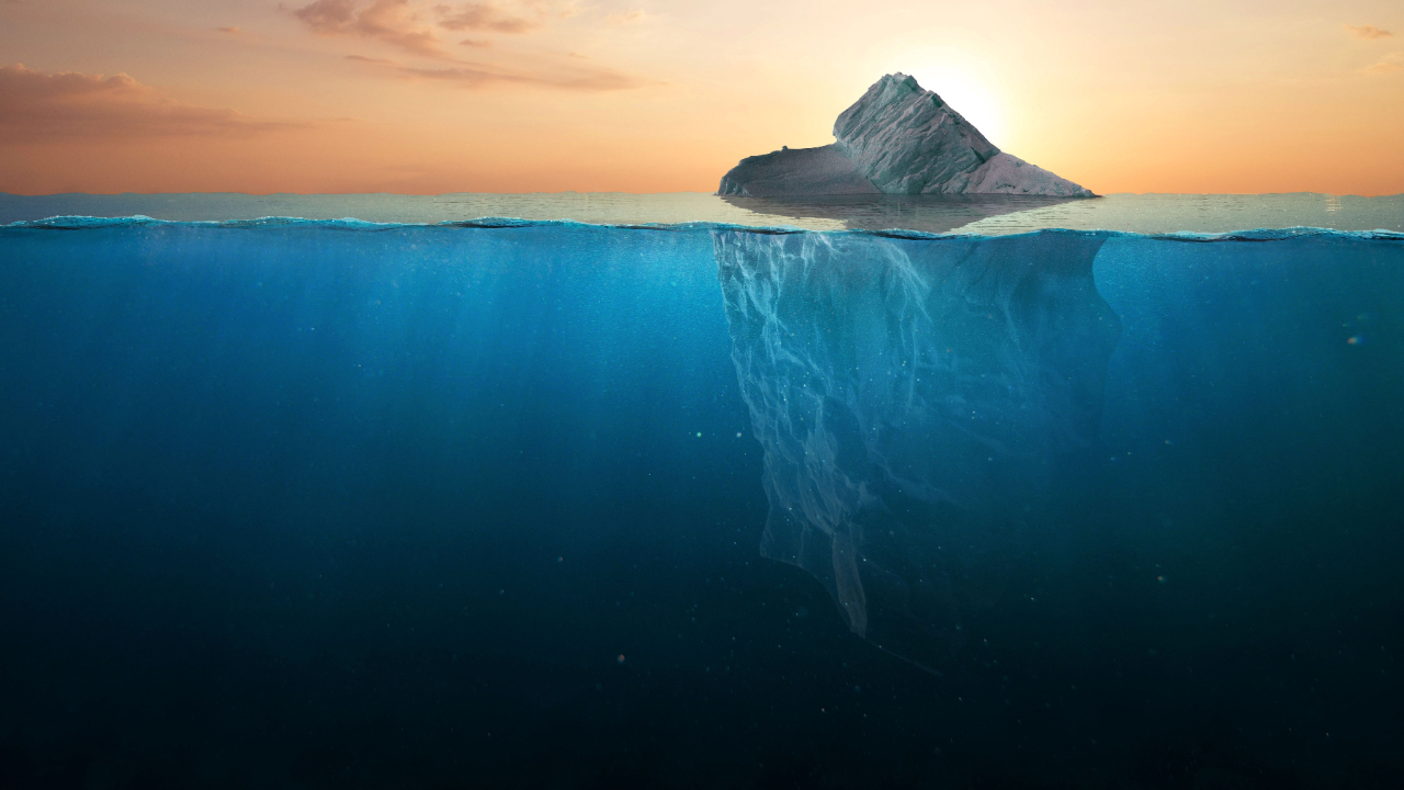 view of iceberg both above and below water