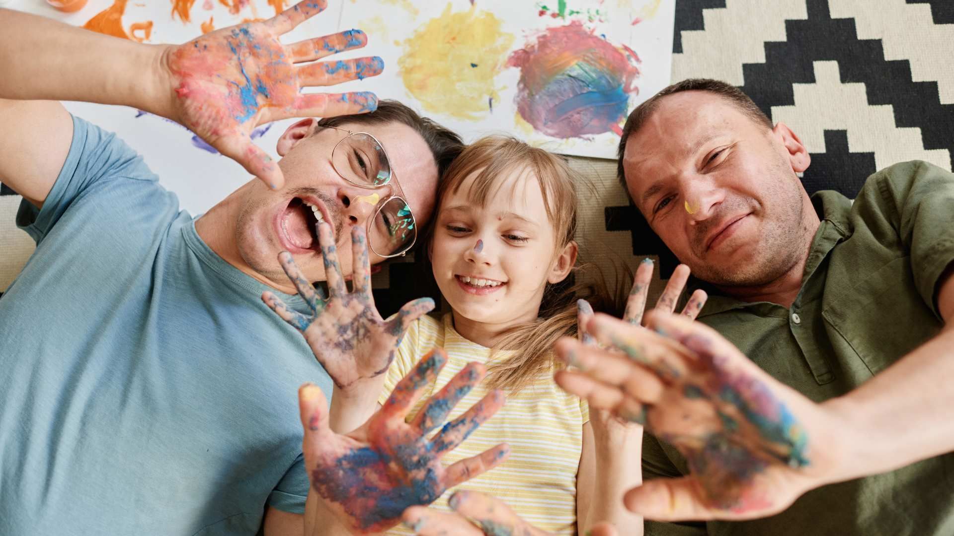 parents and child cuddling and happy 