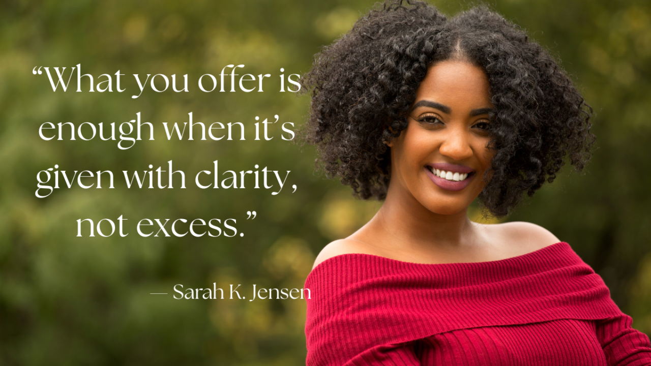 Smiling woman in a red sweater outdoors with the quote “What you offer is enough when it’s given with clarity, not excess.” — Sarah K. Jensen, representing confident, balanced care and intentional giving