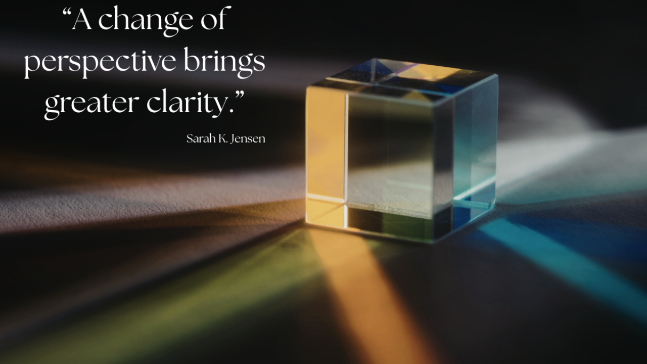 Glass prism refracting light into multiple colors with overlaid quote about perspective and clarity, symbolizing insight, understanding, and seeing things from a new angle.
