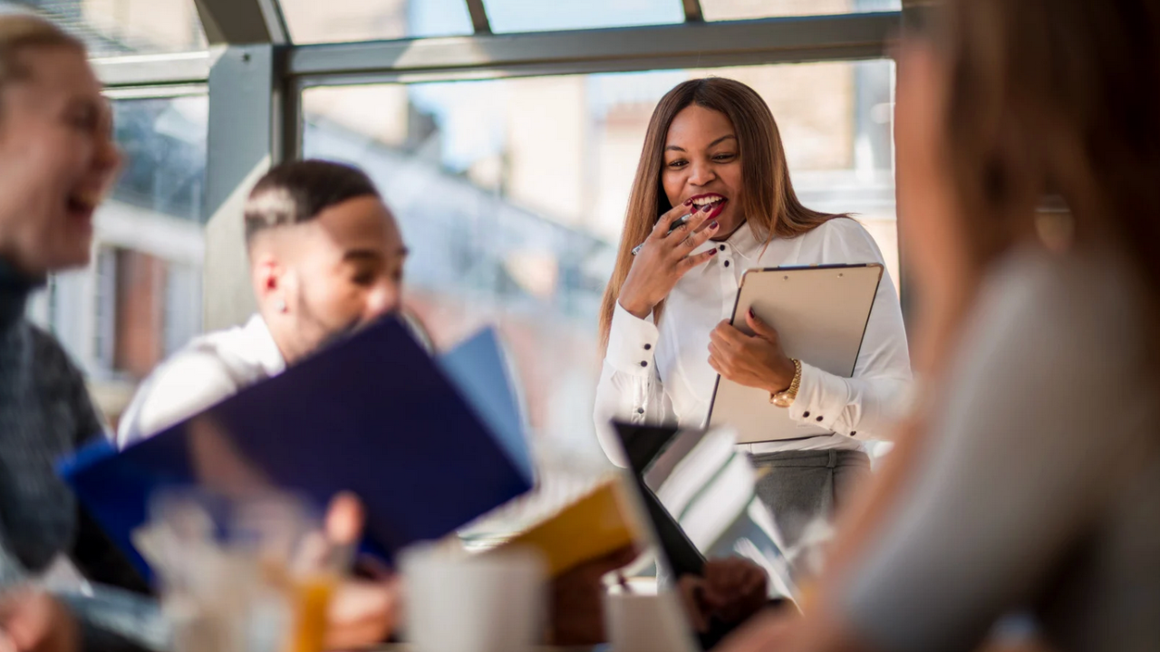 End-of-life educator guiding a small group discussion, fostering trust and meaningful conversation