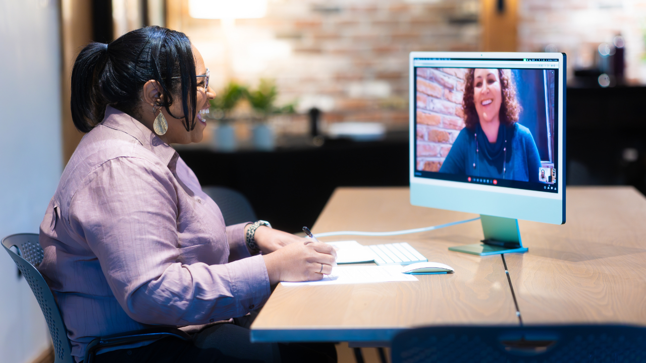 Man standing in front of a glass window