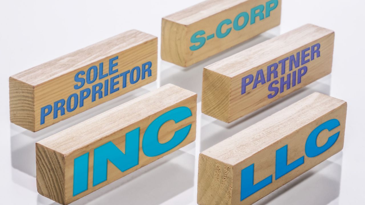 wooden blocks with names of business types on them