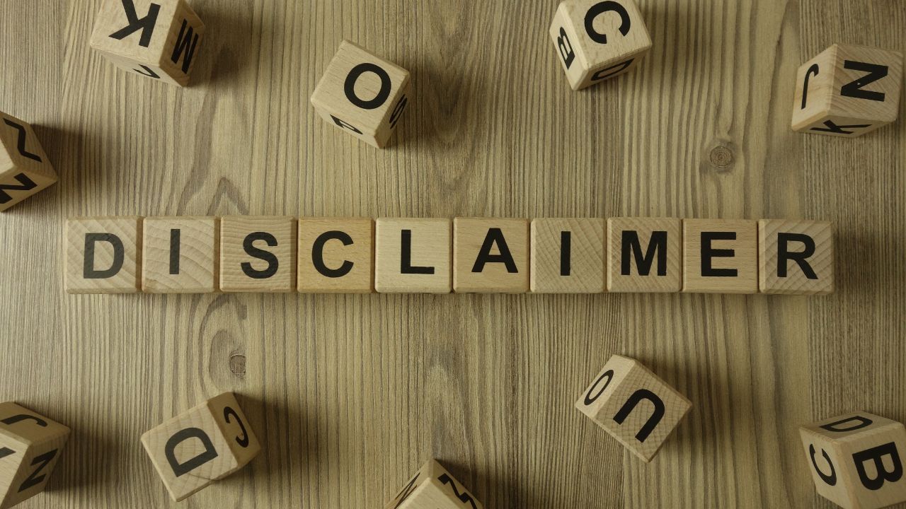 Disclaimer spelled with scrabble letters