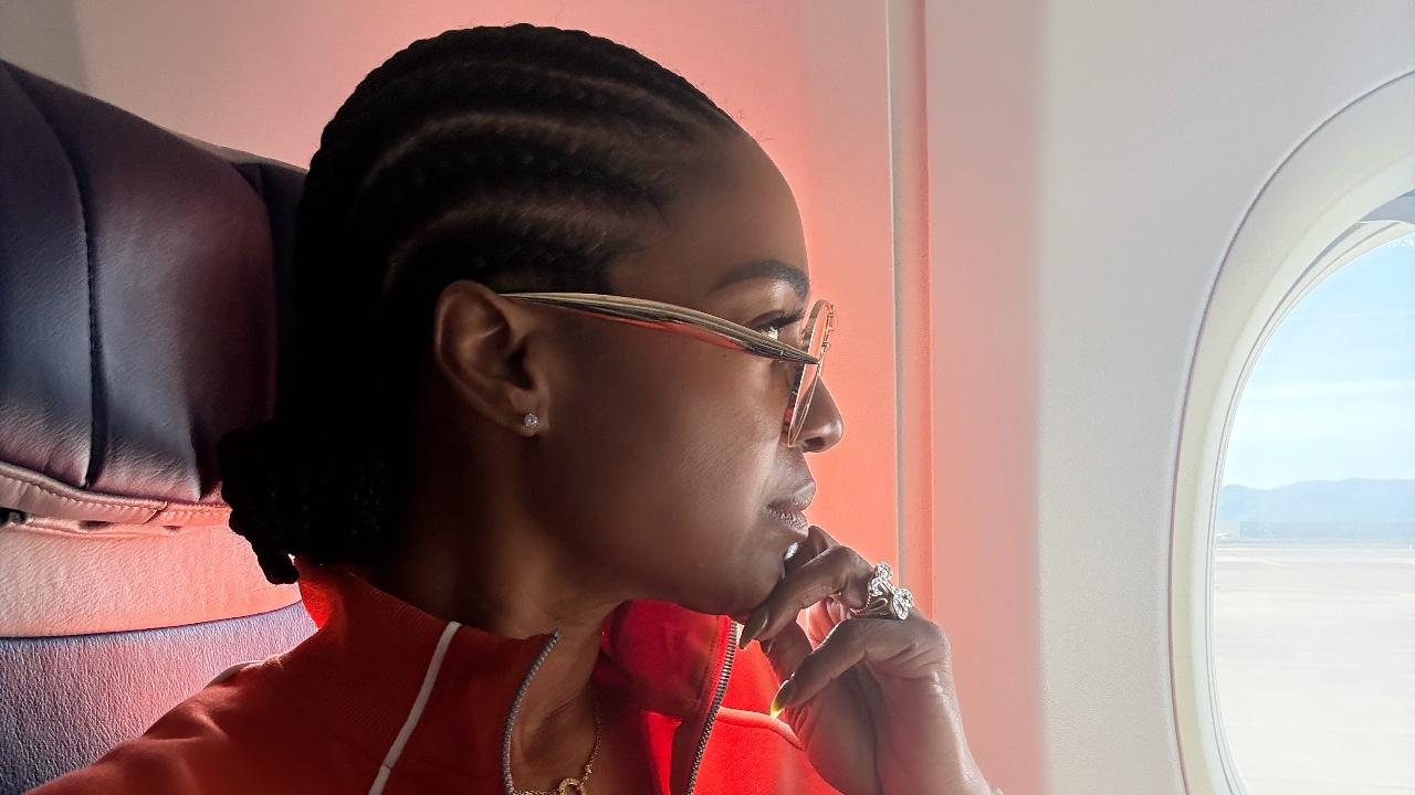  Leslie K. Leland sitting in reflection -- Your Mind Moved On. Your Body Didn't.