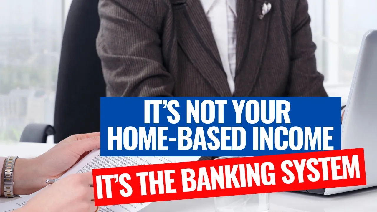 Home-based business owner meeting with banker about mortgage approval with text overlay saying It’s not your home-based income, it’s the banking system.