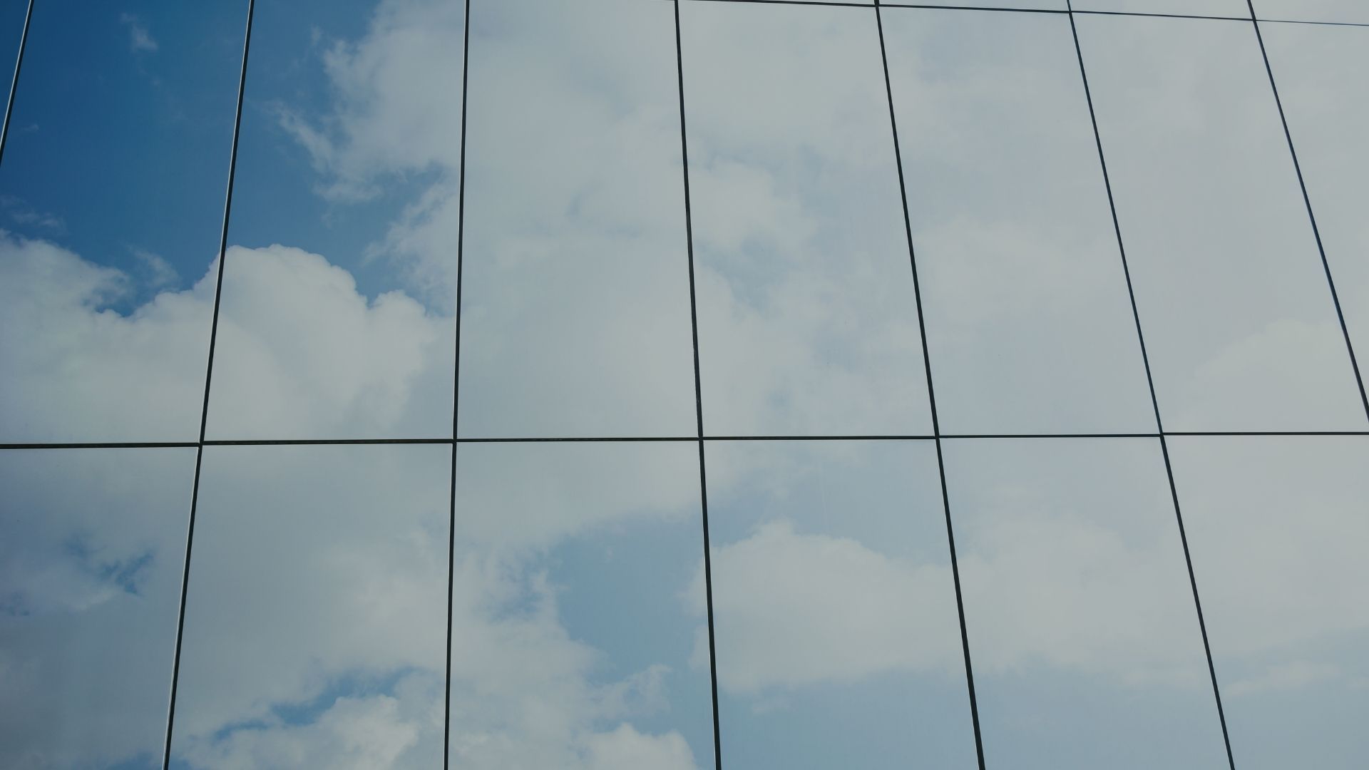 The Mirror and the Window Two Crucial Tools for Self Leadership My Daily Leadership Blog Showing Building With Large Windows Reflecting the Sky