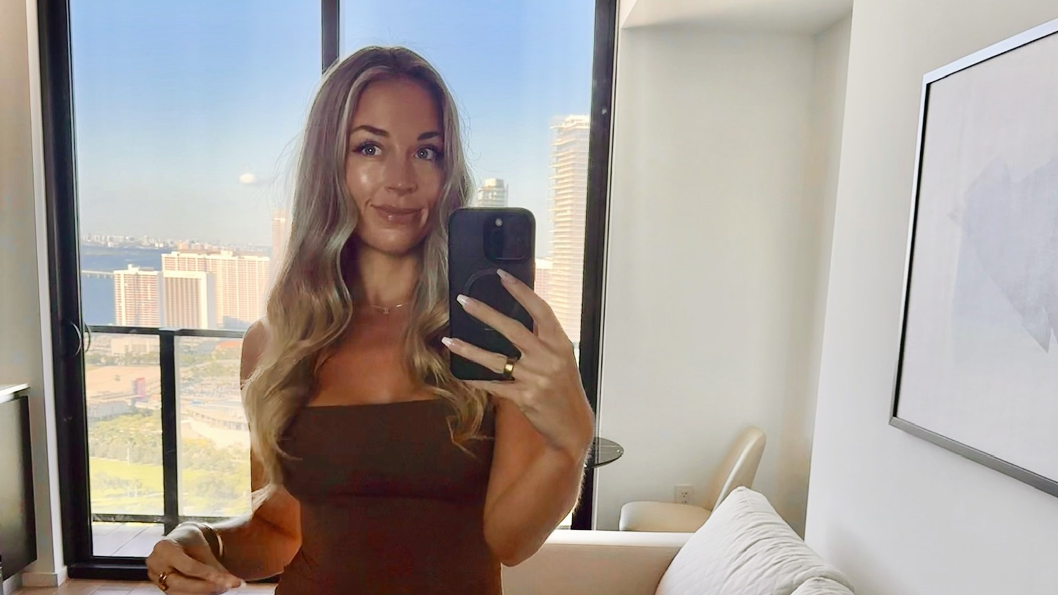 Brittany Arnason in a beautiful high-rise apartment.