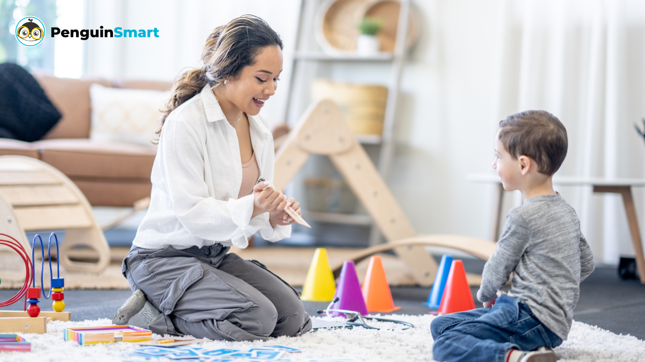 young boy sitting on floor with female speech therapist reviewing flash cards