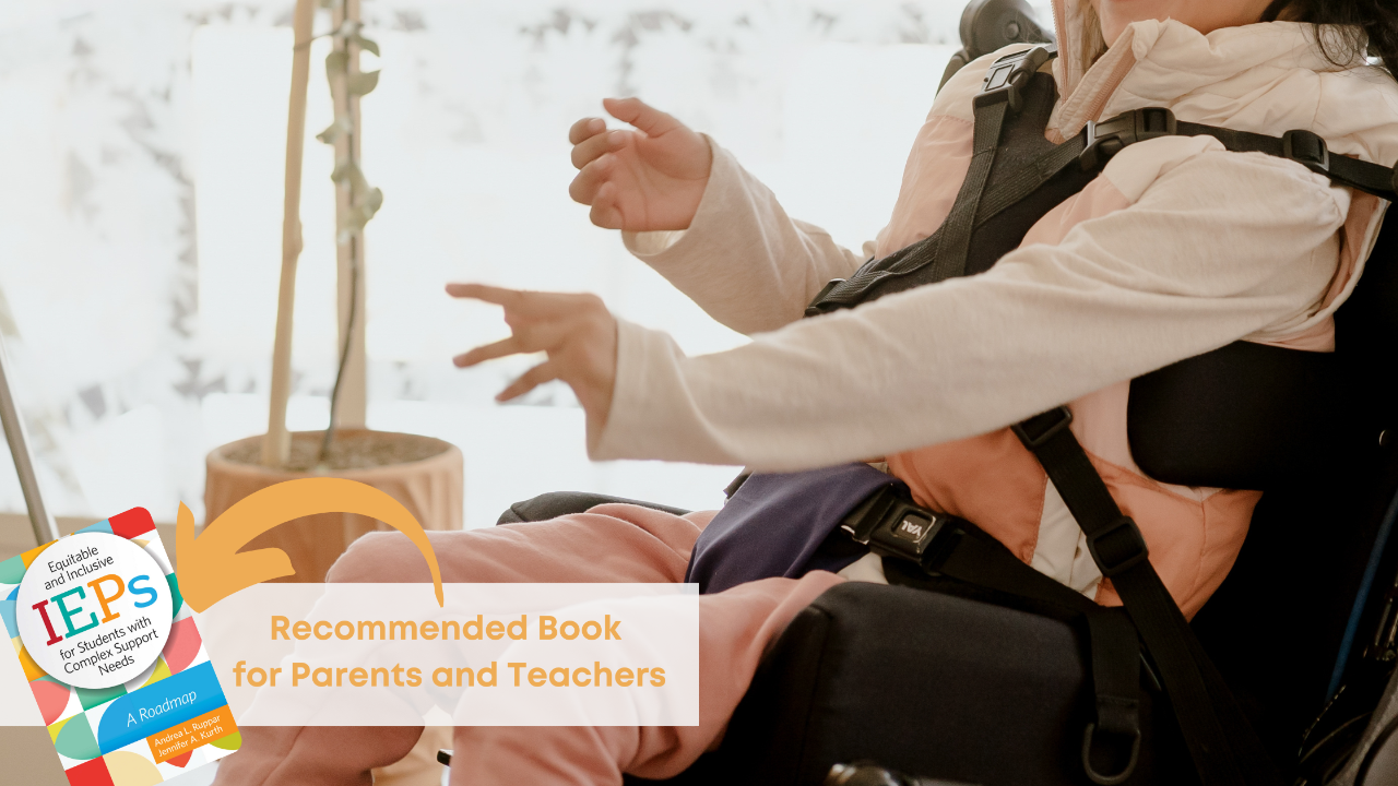 young girl in wheelchair wearing a pink hoodie and pink pants with a picture of the recommended book equitable and inclusive IEPs for children with complex support needs