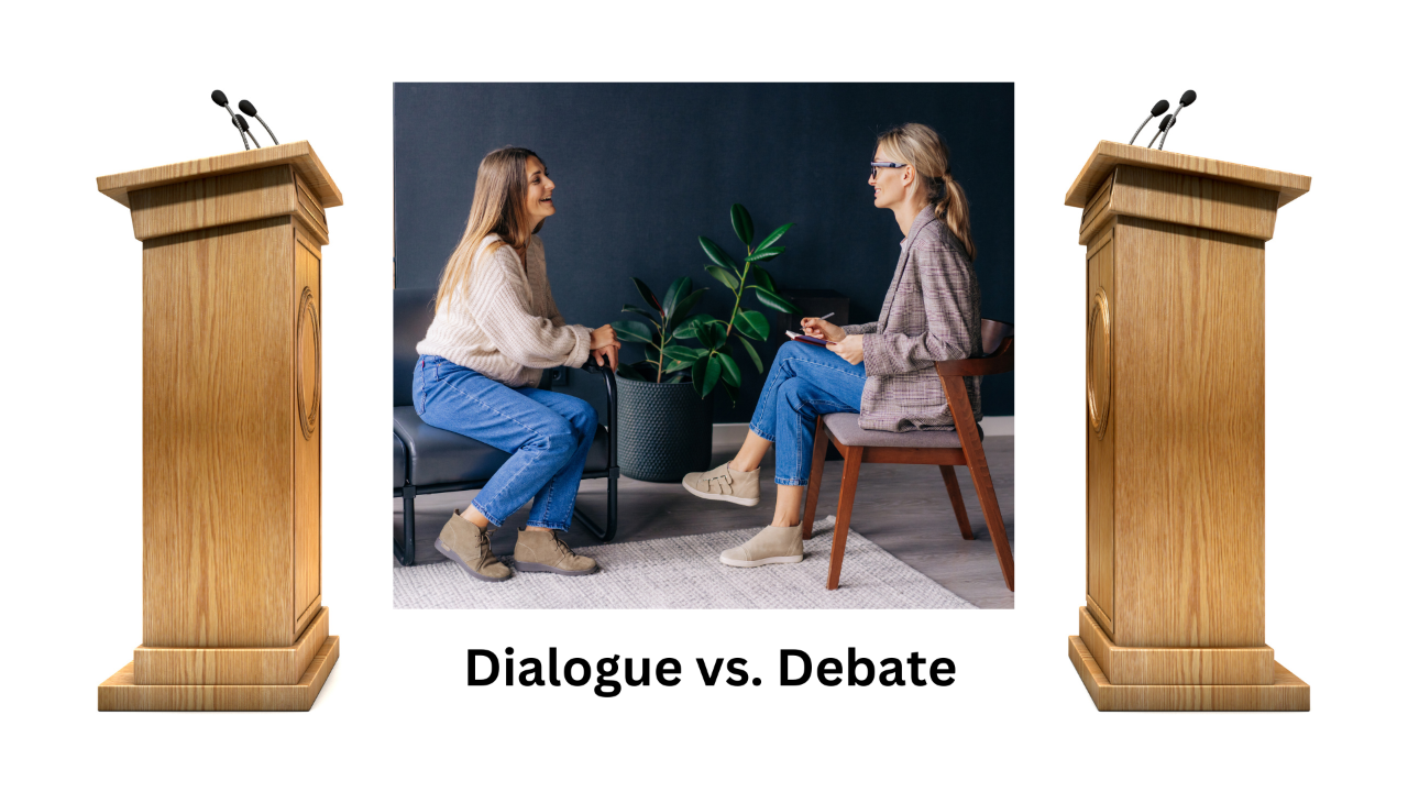 Two women having a conversation, surrounded by two podiums.