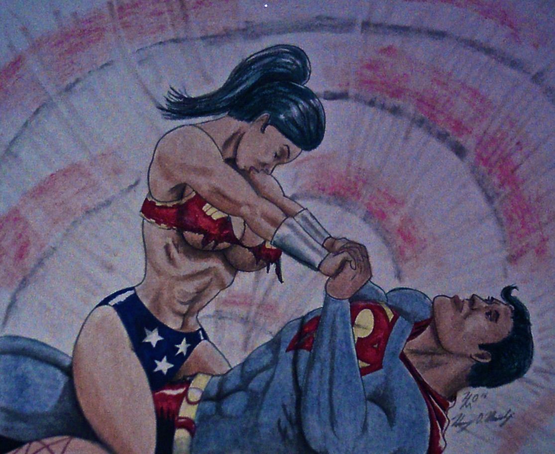 Wonder Woman over powers and straddles Superman