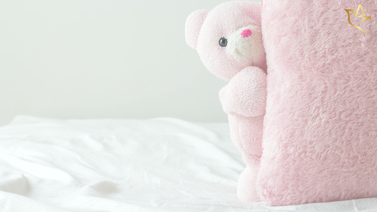 Plush pink teddy bear, representing the My Little Princess funeral program template, designed to help you honor your child's memory in a unique, beautiful way.