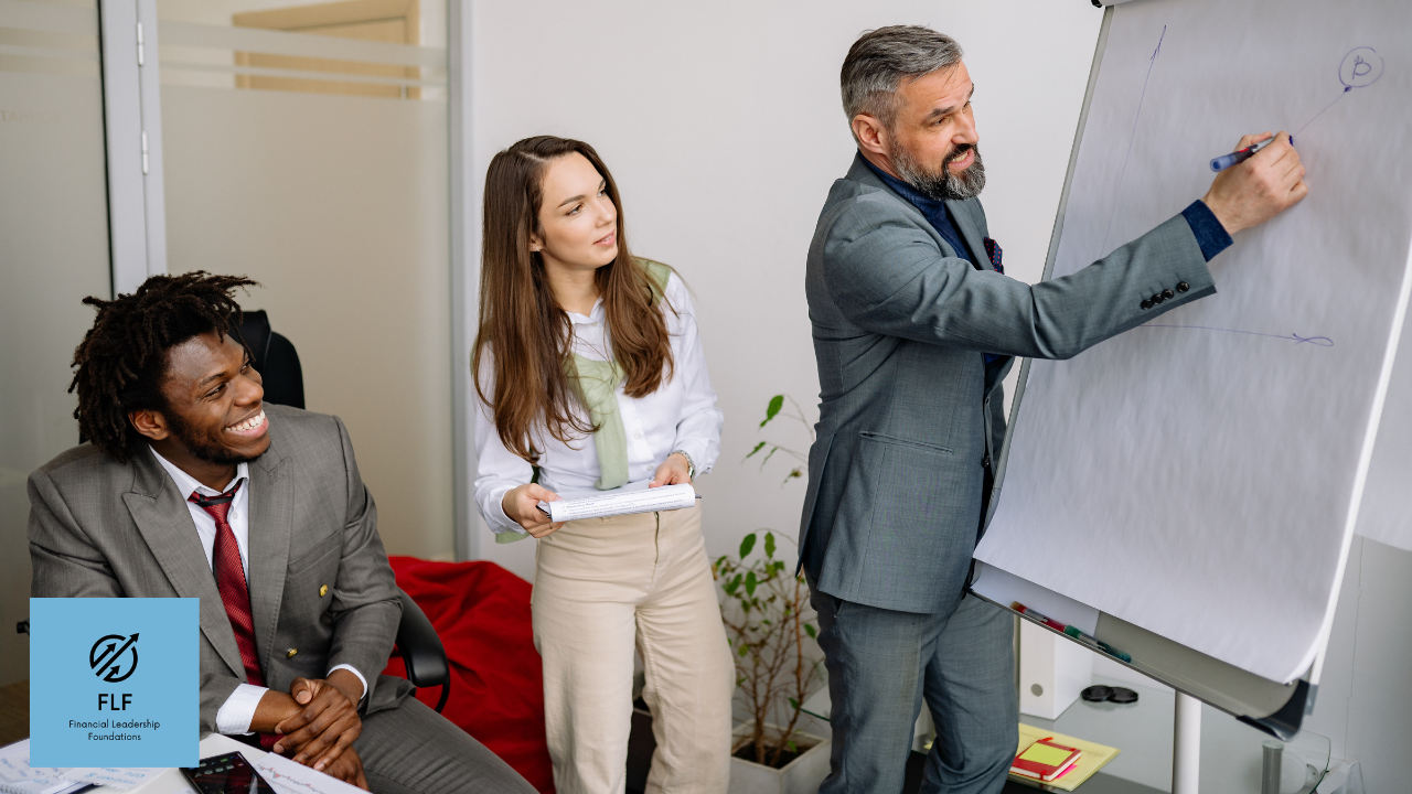 A leader, drawing leadership skills on a whiteboard to two future leaders. The 5 Skills Every Future CFO Must Learn.