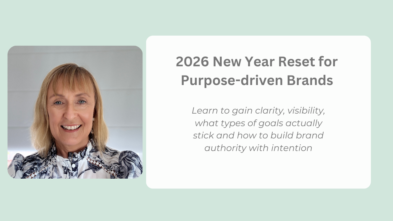 smiling woman Leigh White wearing navy and white floral shirt