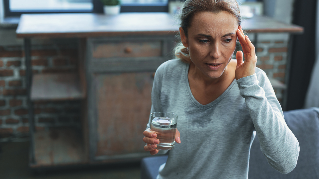 menopausal woman having a headache