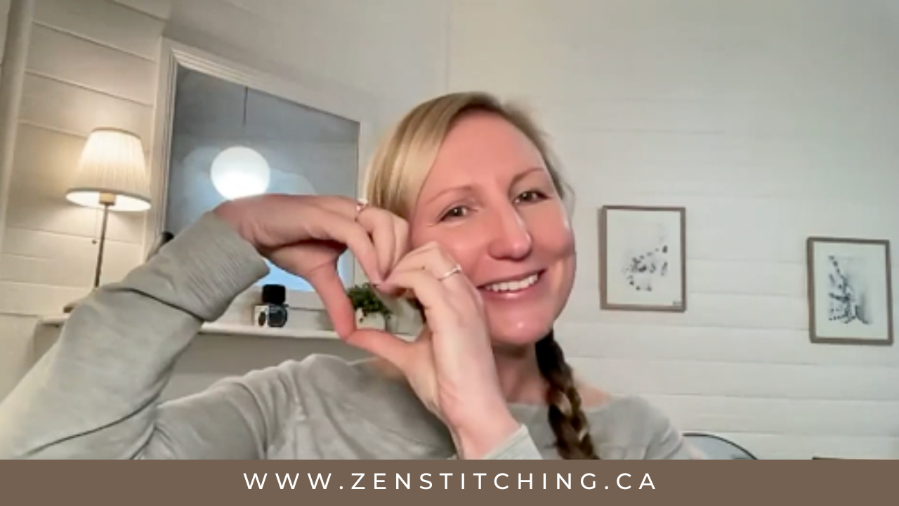 Kate Ward, a white woman with blond hair, looks at the camera, holding her hands in a heart shape next to her face. The bottom of the image reads