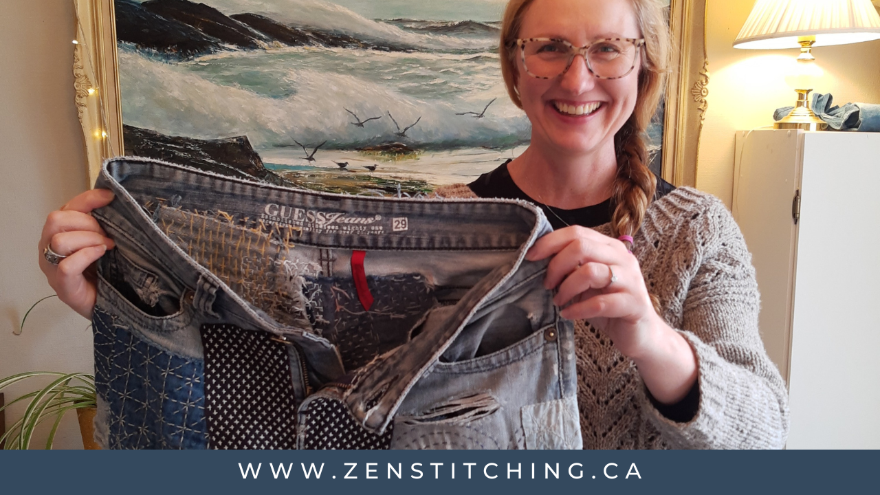 Kate Ward, a white woman with blond hair, looks at the camera, holding a much-repaired pair of jeans. The bottom of the image reads 