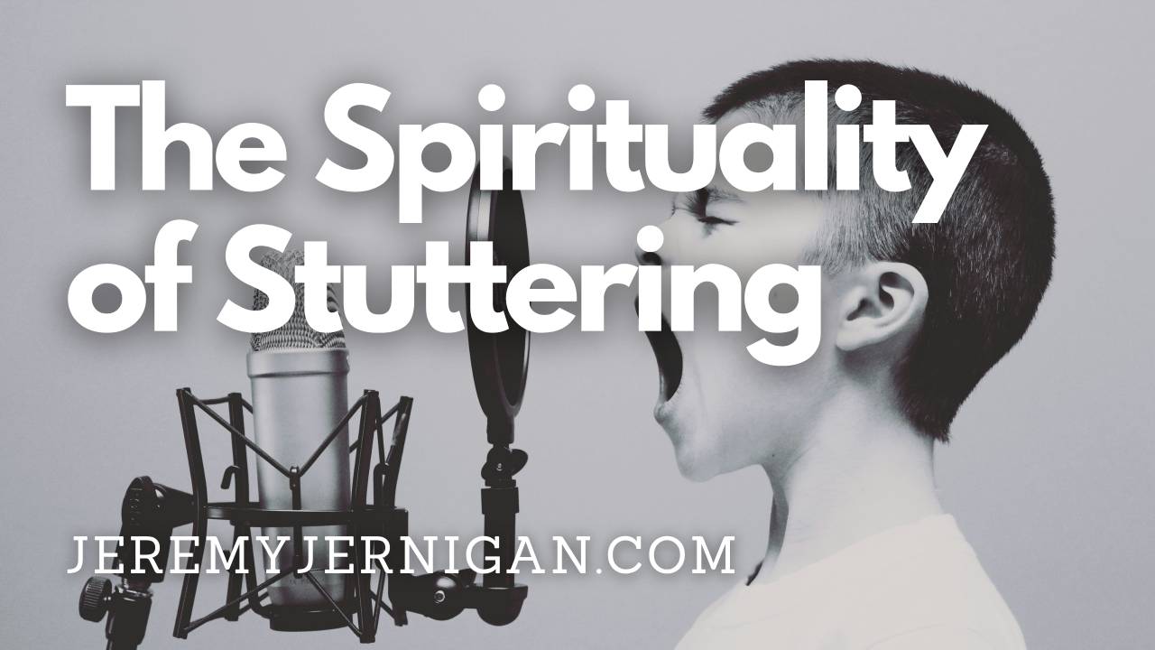 Alt text: Black and white photo of a young person speaking into a studio microphone, with the blog title "The Spirituality of Stuttering" and jeremyjernigan.com overlaid in bold white text.