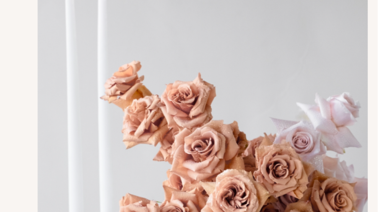 Contemporary arrangement of reflexed Toffee Roses and Sweet Avalanche roses in warm blush tones, textured floral design detail for a Wedding Arrangement