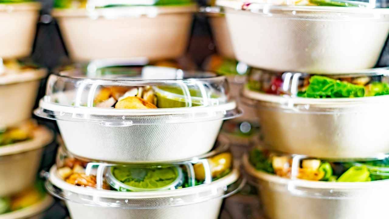 selection of ready made salad on a supermarket shelf