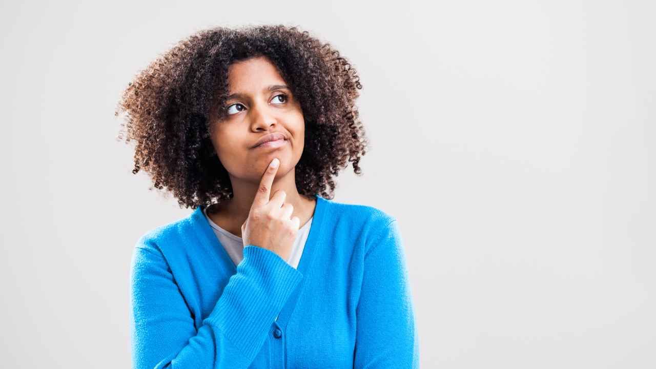 woman thinking before binigng