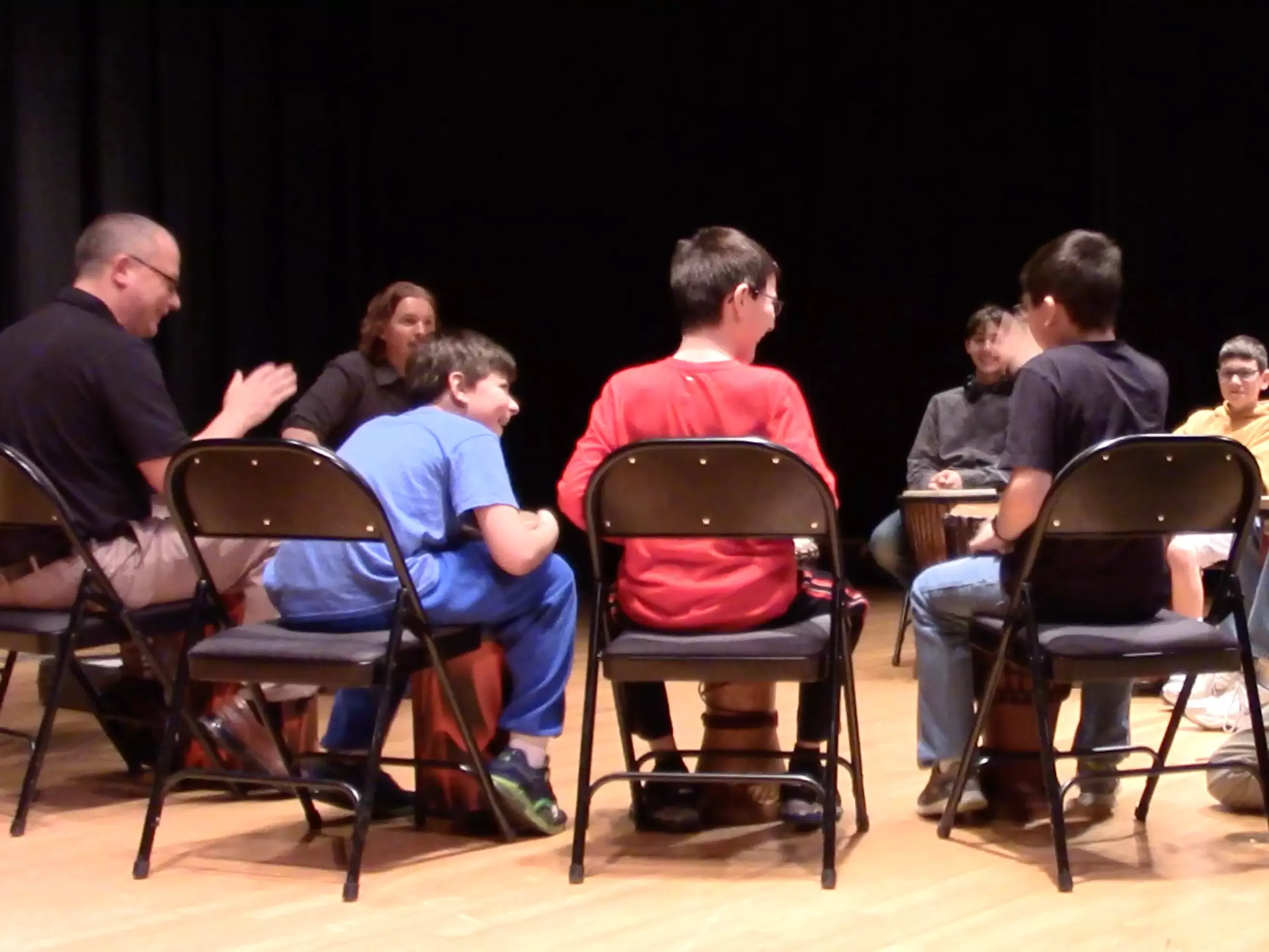  Jim Donovan M.Ed. leads a group of boys with Autism in a group drum circle program