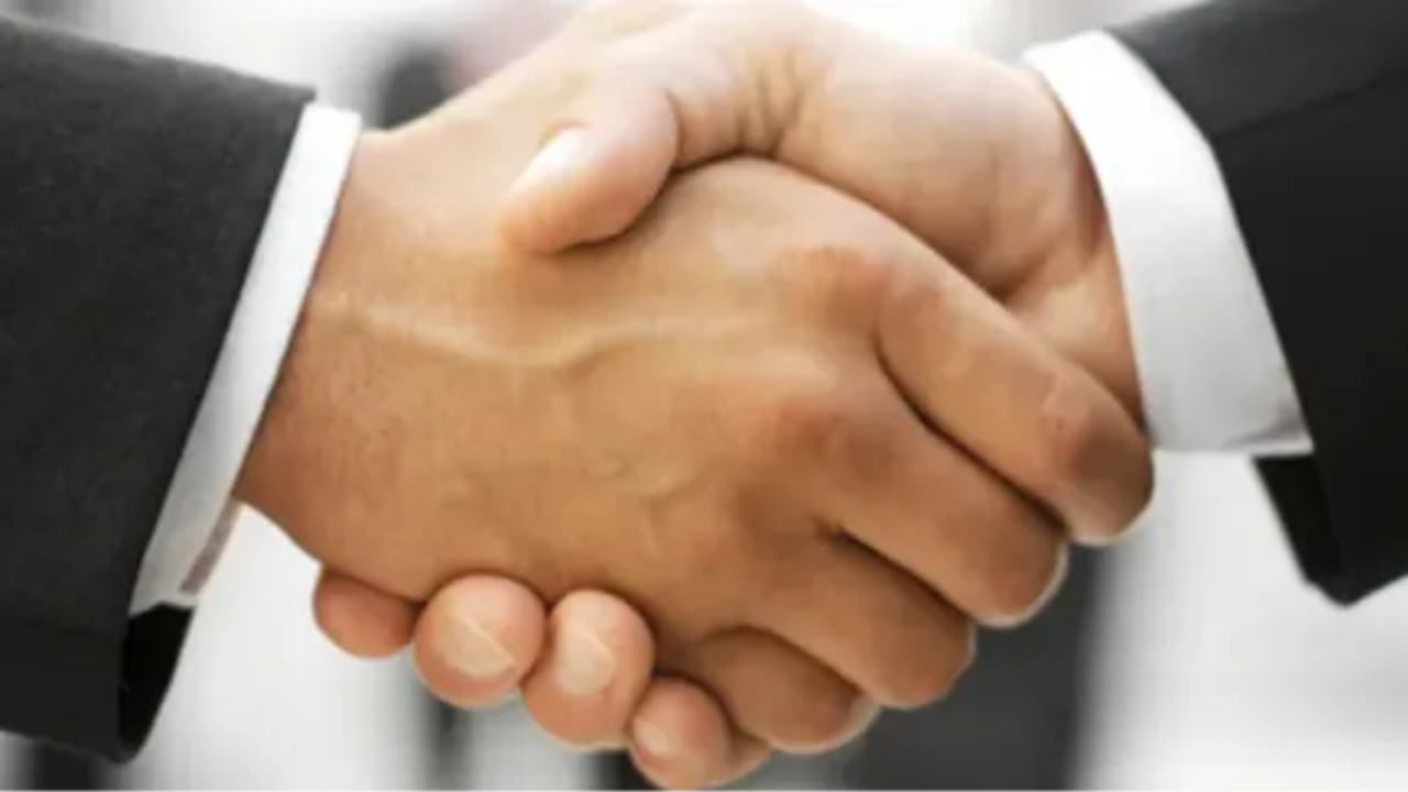 handshake between business executives