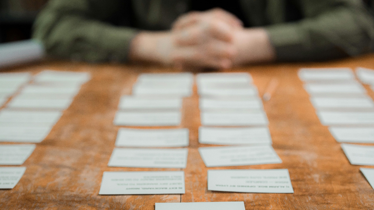 Someone looking over a list of cards