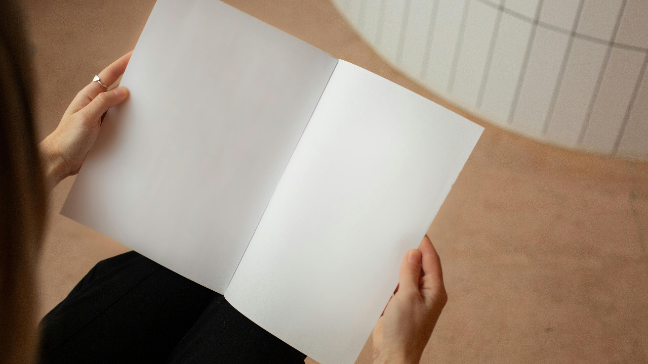 Woman looking at a blank page