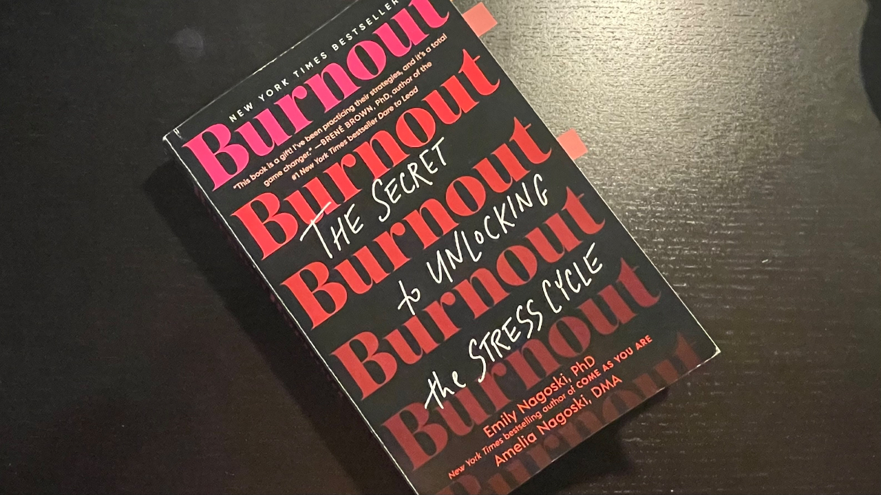 My tabbed and well-read version of "Burnout: The Secret to Unlocking the Stress Cycle" by Emily Nagasaki, PhD and Amelia Nagasaki, DMA